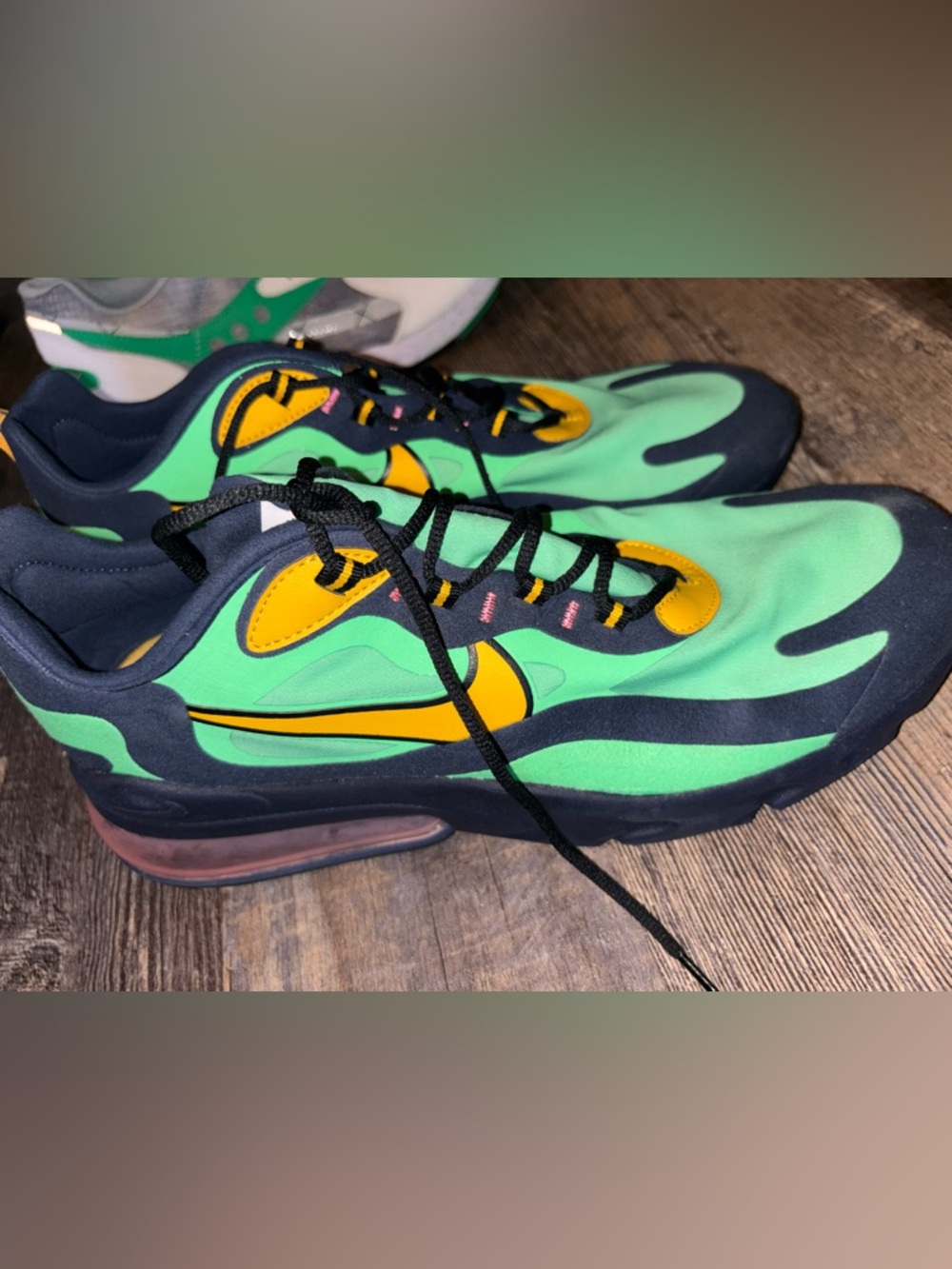 Nike men’s Green and Yellow Wave-Accent Sneakers